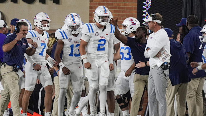 Sep 14, 2024; Winston-Salem, North Carolina, USA; Mississippi Rebels quarterback Jaxson Dart (2) reacts on the sideline to his run in touchdown against the Wake Forest Demon Deacons during the second half at Allegacy Federal Credit Union Stadium. Mandatory Credit: Jim Dedmon-Imagn Images Sep 14, 2024; Winston-Salem, North Carolina, USA; Mississippi Rebels quarterback Jaxson Dart (2) reacts on the sideline to his run in touchdown against the Wake Forest Demon Deacons during the second half at Allegacy Federal Credit Union Stadium. Mandatory Credit: Jim Dedmon-Imagn Images