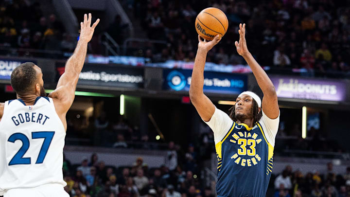Mar 24, 2025; Indianapolis, Indiana, USA; Indiana Pacers center Myles Turner (33) shoots the ball while Minnesota Timberwolves center Rudy Gobert (27) defends in the second half at Gainbridge Fieldhouse. Mandatory Credit: Trevor Ruszkowski-Imagn Images Mar 24, 2025; Indianapolis, Indiana, USA; Indiana Pacers center Myles Turner (33) shoots the ball while Minnesota Timberwolves center Rudy Gobert (27) defends in the second half at Gainbridge Fieldhouse. Mandatory Credit: Trevor Ruszkowski-Imagn Images