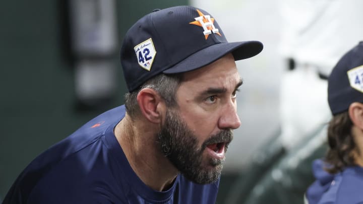 Apr 15, 2024; Houston, Texas, USA; Houston Astros pitcher Justin Verlander (35) watches the Astros field against the Atlanta Braves in the sixth inning at Minute Maid Park. All players wore #42 in honor of Jackie Robinson Day