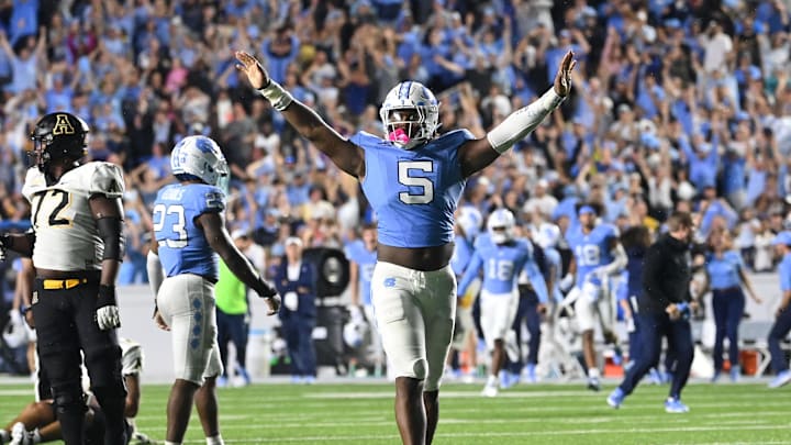 Sep 9, 2023; Chapel Hill, North Carolina, USA; North Carolina Tar Heels defensive lineman Jahvaree Ritzie (5) reacts after the Tar Heels win in the second overtime at Kenan Memorial Stadium. Mandatory Credit: Bob Donnan-Imagn Images