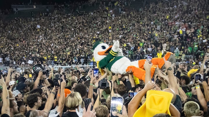The Oregon Duck crowd surfs as fans storm the field as the No. 3 Oregon Ducks host the No. 2 Ohio State Buckeyes Saturday, Oct. 12, 2024 at Autzen Stadium in Eugene, Ore.
