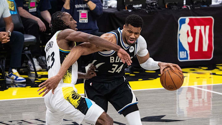 Apr 22, 2025; Indianapolis, Indiana, USA; Milwaukee Bucks forward Giannis Antetokounmpo (34) dribbles the ball while Indiana Pacers forward Aaron Nesmith (23) defends during game two of first round for the 2024 NBA Playoffs at Gainbridge Fieldhouse. Mandatory Credit: Trevor Ruszkowski-Imagn Images Apr 22, 2025; Indianapolis, Indiana, USA; Milwaukee Bucks forward Giannis Antetokounmpo (34) dribbles the ball while Indiana Pacers forward Aaron Nesmith (23) defends during game two of first round for the 2024 NBA Playoffs at Gainbridge Fieldhouse. Mandatory Credit: Trevor Ruszkowski-Imagn Images