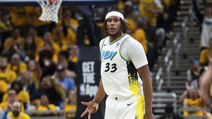 Apr 19, 2025; Indianapolis, Indiana, USA; Indiana Pacers center Myles Turner (33) celebrates a made basket  in the second half against the Milwaukee Bucks at Gainbridge Fieldhouse. Mandatory Credit: Trevor Ruszkowski-Imagn Images