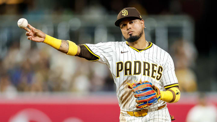 Sep 13, 2025; San Diego, California, USA; San Diego Padres second baseman Luis Arraez (4) throws to first base for an out during the seventh inning against the Colorado Rockies at Petco Park. Mandatory Credit: David Frerker-Imagn Images Sep 13, 2025; San Diego, California, USA; San Diego Padres second baseman Luis Arraez (4) throws to first base for an out during the seventh inning against the Colorado Rockies at Petco Park. Mandatory Credit: David Frerker-Imagn Images