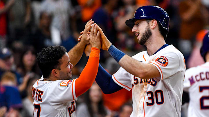 Houston Astros players Kyle Tucker, Jose Altuve