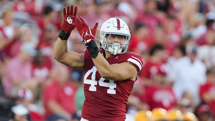 Oklahoma defensive lineman Taylor Wein celebrates a sack during the second half of Saturday's game vs. Kent State. The Sooners' defensive line was dominant yet again as OU posted its second shutout of the Brent Venables' era.