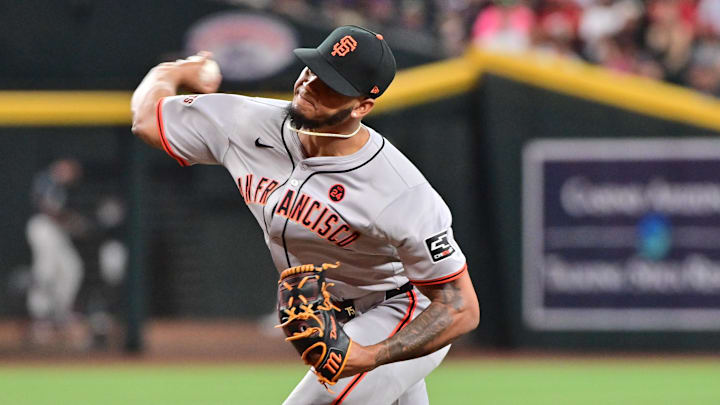 Sep 23, 2024; Phoenix, Arizona, USA;  San Francisco Giants pitcher Camilo Doval (75) throws in the eighth inning against the Arizona Diamondbacks at Chase Field. 