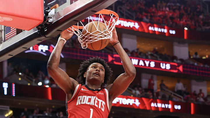 Houston Rockets forward Amen Thompson dunks against the Golden State Warriors in the fourth quarter