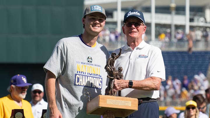 Jun 22, 2025; Omaha, Neb, USA; LSU Tigers pitcher Kade Anderson (32) accepts the Most Outstanding Player Award after the game against the Coastal Carolina Chanticleers at Charles Schwab Field. Mandatory Credit: Steven Branscombe-Imagn Images Jun 22, 2025; Omaha, Neb, USA; LSU Tigers pitcher Kade Anderson (32) accepts the Most Outstanding Player Award after the game against the Coastal Carolina Chanticleers at Charles Schwab Field. Mandatory Credit: Steven Branscombe-Imagn Images