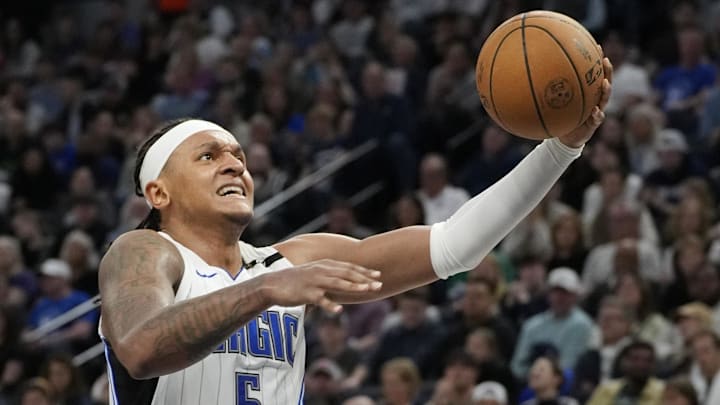 Orlando Magic forward Paolo Banchero goes to the basket against the Minnesota Timberwolves. Orlando Magic forward Paolo Banchero goes to the basket against the Minnesota Timberwolves.