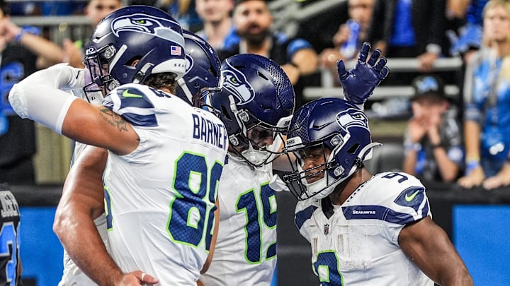 Seattle Seahawks running back Kenneth Walker III (9) celebrates his touchdown with teammates during the Lions game against the Seattle Seahawks at Ford Field in Detroit, Tuesday, Oct. 1, 2024. Seattle Seahawks running back Kenneth Walker III (9) celebrates his touchdown with teammates during the Lions game against the Seattle Seahawks at Ford Field in Detroit, Tuesday, Oct. 1, 2024.