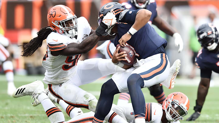 Jadeveon Clowney sacks former Bears quarterback Justin Fields in 2021. Clowney says he has been in contact with "four or five" teams.