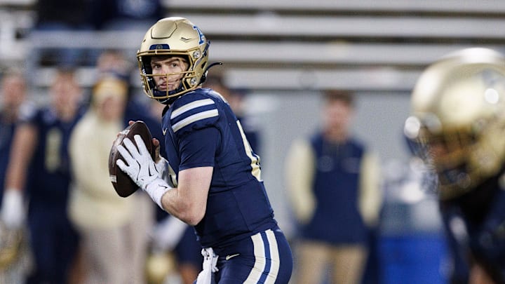 Akron quarterback Ben Finley looks for a receiver during the second half of a game against Eastern Michigan on Saturday, Oct. 26, 2024 in Akron, Ohio.