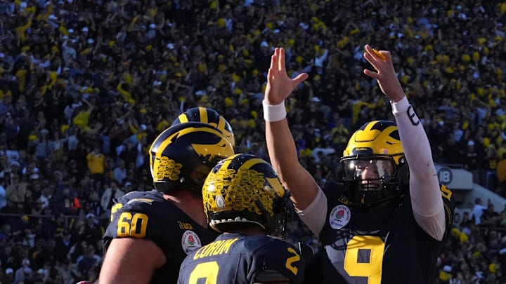 Jan 1, 2024; Pasadena, CA, USA; Michigan Wolverines running back Blake Corum (2) is congratulated by