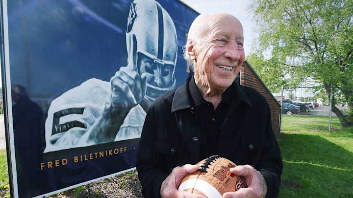 Fred Biletnikoff jokes with friends prior to a dedication ceremony at Biletnikoff Field adjacent to Erie High School in Erie on May 25, 2023. Erie native and NFL Hall of Fame receiver Biletnikoff, 80, attended numerous events over the weekend marking the field's dedication.