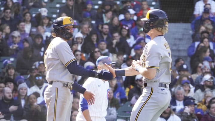 Apr 2, 2023; Chicago, Illinois, USA; Milwaukee Brewers second baseman Brice Turang (left) and