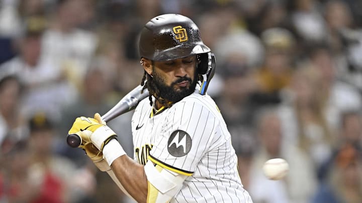 Aug 19, 2025; San Diego, California, USA; San Diego Padres right fielder Fernando Tatis Jr. (23) dodges a pitch during the third inning against the San Francisco Giants at Petco Park. Mandatory Credit: Denis Poroy-Imagn Images Aug 19, 2025; San Diego, California, USA; San Diego Padres right fielder Fernando Tatis Jr. (23) dodges a pitch during the third inning against the San Francisco Giants at Petco Park. Mandatory Credit: Denis Poroy-Imagn Images