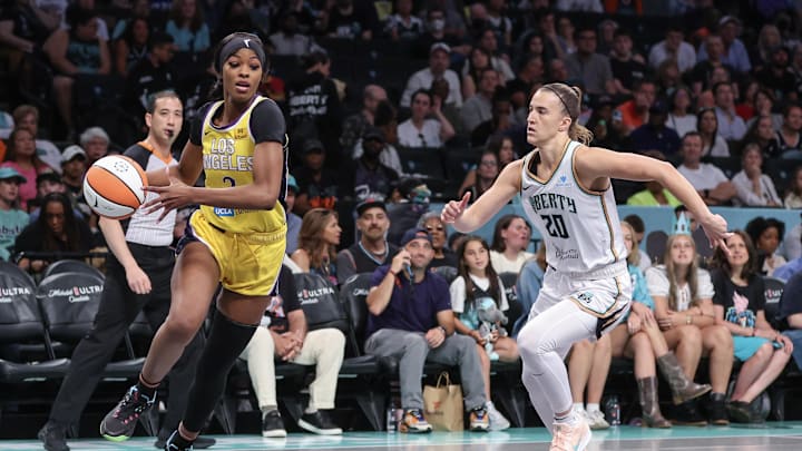 Jul 3, 2025; Brooklyn, New York, USA; Los Angeles Sparks forward Rickea Jackson (2) drives past New York Liberty guard Sabrina Ionescu (20) in the first quarter at Barclays Center. Mandatory Credit: Wendell Cruz-Imagn Images Jul 3, 2025; Brooklyn, New York, USA; Los Angeles Sparks forward Rickea Jackson (2) drives past New York Liberty guard Sabrina Ionescu (20) in the first quarter at Barclays Center. Mandatory Credit: Wendell Cruz-Imagn Images