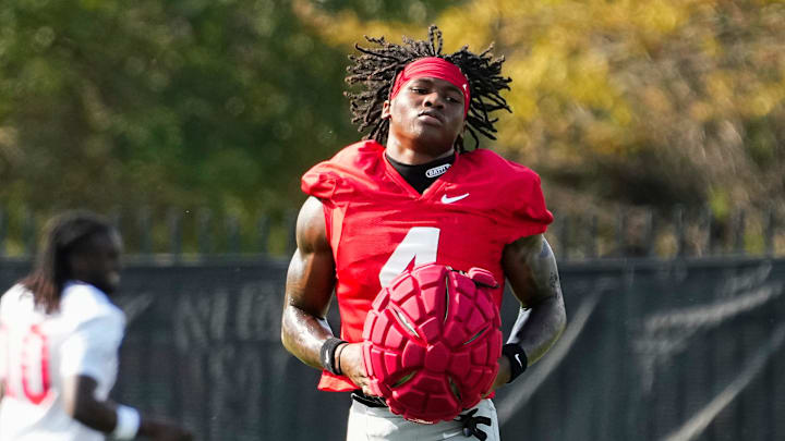 Aug 1, 2024; Columbus, OH, USA; Ohio State Buckeyes wide receiver Jeremiah Smith (4) runs during football camp at the Woody Hayes Athletic Complex.