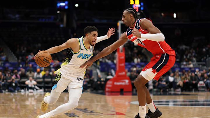 Feb 12, 2025; Washington, District of Columbia, USA; Indiana Pacers guard Tyrese Haliburton (0) drives to the basket as Washington Wizards forward Alex Sarr (20) defends in overtime at Capital One Arena. Mandatory Credit: Geoff Burke-Imagn Images Feb 12, 2025; Washington, District of Columbia, USA; Indiana Pacers guard Tyrese Haliburton (0) drives to the basket as Washington Wizards forward Alex Sarr (20) defends in overtime at Capital One Arena. Mandatory Credit: Geoff Burke-Imagn Images