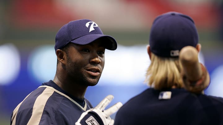 San Diego Padres infielder #29 Josh Barfield (left) talks with shortstop #3 Khalil Greene during batting practice before a game against the Milwaukee Brewers at Miller Park.