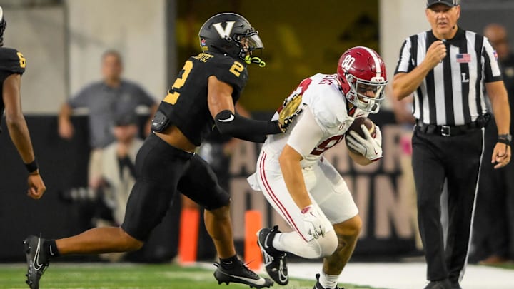 Oct 5, 2024; Nashville, Tennessee, USA;  Vanderbilt Commodores linebacker Randon Fontenette (2) knocks Alabama Crimson Tide tight end Josh Cuevas (80) out of bounds during the second half at FirstBank Stadium. Mandatory Credit: Steve Roberts-Imagn Images