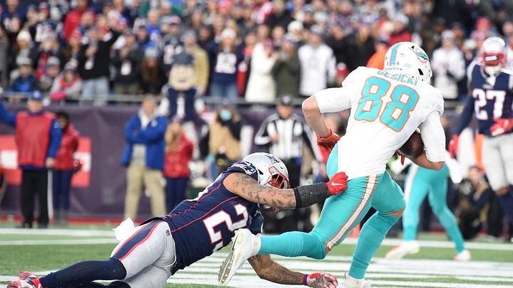 Miami Dolphins tight end Mike Gesicki (88) makes a catch for a touchdown past New England Patriots strong safety Patrick Chung (23) during the second half at Gillette Stadium in the 2019 season finale. Miami Dolphins tight end Mike Gesicki (88) makes a catch for a touchdown past New England Patriots strong safety Patrick Chung (23) during the second half at Gillette Stadium in the 2019 season finale.