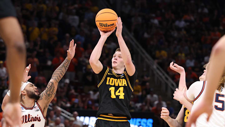 Mar 28, 2026; Houston, TX, USA; Iowa Hawkeyes guard Bennett Stirtz (14) shoots against Illinois Fighting Illini guard Kylan Boswell (4) in the second half during an Elite Eight game of the South Regional of the men's 2026 NCAA Tournament at Toyota Center. Mandatory Credit: Troy Taormina-Imagn Images Mar 28, 2026; Houston, TX, USA; Iowa Hawkeyes guard Bennett Stirtz (14) shoots against Illinois Fighting Illini guard Kylan Boswell (4) in the second half during an Elite Eight game of the South Regional of the men's 2026 NCAA Tournament at Toyota Center. Mandatory Credit: Troy Taormina-Imagn Images