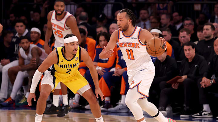 Oct 25, 2024; New York, New York, USA; New York Knicks guard Jalen Brunson (11) controls the ball against Indiana Pacers guard Andrew Nembhard (2) during the first quarter at Madison Square Garden. Mandatory Credit: Brad Penner-Imagn Images