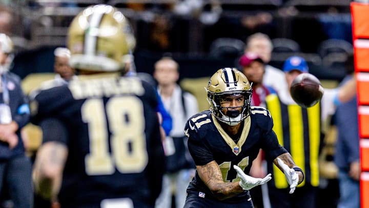 Dec 29, 2024; New Orleans, Louisiana, USA; New Orleans Saints quarterback Spencer Rattler (18) passes to wide receiver Cedrick Wilson Jr. (11) against the Las Vegas Raiders during the second half at Caesars Superdome. Mandatory Credit: Stephen Lew-Imagn Images Dec 29, 2024; New Orleans, Louisiana, USA; New Orleans Saints quarterback Spencer Rattler (18) passes to wide receiver Cedrick Wilson Jr. (11) against the Las Vegas Raiders during the second half at Caesars Superdome. Mandatory Credit: Stephen Lew-Imagn Images