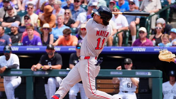 Jun 24, 2026; Denver, Colorado, USA; Boston Red Sox short stop Marcelo Mayer (11) doubles in fifth inning against the Colorado Rockies at Coors Field. Mandatory Credit: Ron Chenoy-Imagn Images