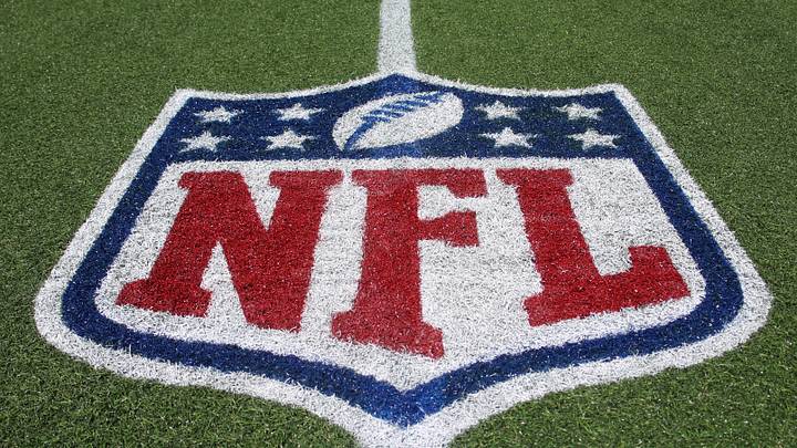 Aug 6, 2026; Canton, Ohio, USA; The NFL shield logo on the field before the Carolina Panthers and Arizona Cardinals play at Tom Benson Hall of Fame Stadium. Mandatory Credit: Charles LeClaire-Imagn Images Aug 6, 2026; Canton, Ohio, USA; The NFL shield logo on the field before the Carolina Panthers and Arizona Cardinals play at Tom Benson Hall of Fame Stadium. Mandatory Credit: Charles LeClaire-Imagn Images