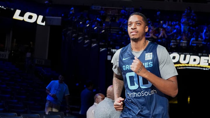Grizzlies' Armando Bacot (00) runs on the court as he is introduced during open practice at FedExForum in Memphis, Tenn., on Sunday, October 6, 2024.