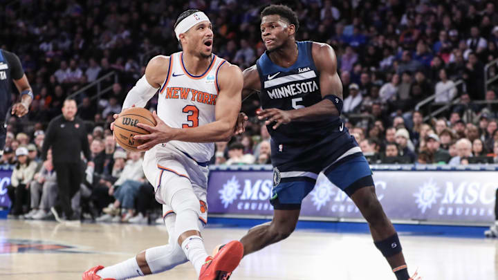 Jan 1, 2024; New York, New York, USA;  New York Knicks guard Josh Hart (3) looks to drive past Minnesota Timberwolves guard Anthony Edwards (5) in the third quarter at Madison Square Garden. Mandatory Credit: Wendell Cruz-Imagn Images