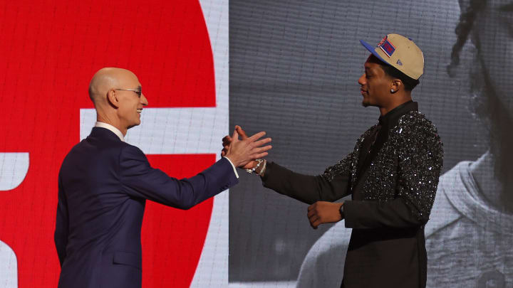 Jun 26, 2024; Brooklyn, NY, USA; Ron Holland II shakes hands with NBA commissioner Adam Silver after being selected in the first round by the Detroit Pistons in the 2024 NBA Draft at Barclays Center. Mandatory Credit: Brad Penner-USA TODAY Sports Jun 26, 2024; Brooklyn, NY, USA; Ron Holland II shakes hands with NBA commissioner Adam Silver after being selected in the first round by the Detroit Pistons in the 2024 NBA Draft at Barclays Center. Mandatory Credit: Brad Penner-USA TODAY Sports