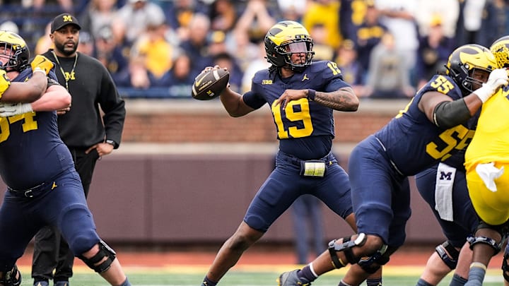 Team Blue quarterback Bryce Underwood (19) makes a pass against Team Maize during the first half of the spring game at Michigan Stadium in Ann Arbor on Saturday, April 19, 2025.