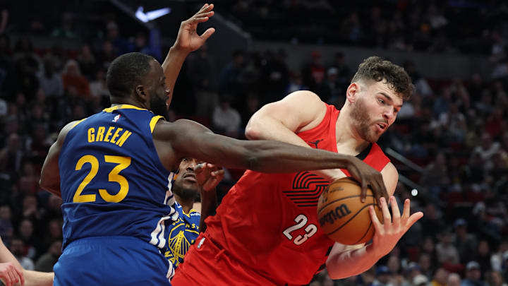 Draymond Green and Donovan Clingan Draymond Green and Donovan Clingan