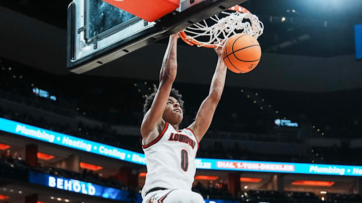 Louisville Cardinals guard Mikel Brown Jr. (0) slams down two points against Eastern Michigan Monday night, Nov. 24, 2025 at the KFC Yum! Center in Louisville, Kentucky.