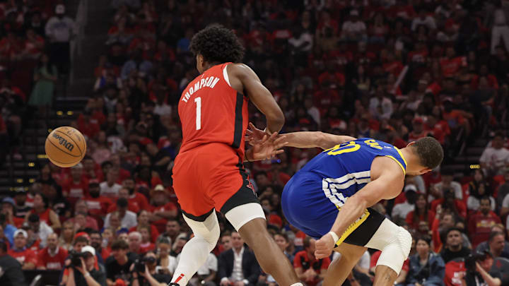 Apr 30, 2025; Houston, Texas, USA;Houston Rockets forward Amen Thompson (1) steals the ball from Golden State Warriors guard Stephen Curry (30) in the second quarter during game five of first round for the 2025 NBA Playoffs at Toyota Center. Mandatory Credit: Thomas Shea-Imagn Images Apr 30, 2025; Houston, Texas, USA;Houston Rockets forward Amen Thompson (1) steals the ball from Golden State Warriors guard Stephen Curry (30) in the second quarter during game five of first round for the 2025 NBA Playoffs at Toyota Center. Mandatory Credit: Thomas Shea-Imagn Images