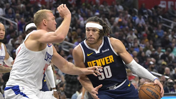 Apr 4, 2024; Los Angeles, California, USA; Denver Nuggets forward Aaron Gordon (50) drives against