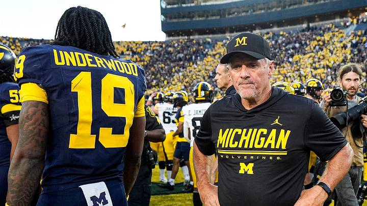 Michigan head coach Kyle Whittingham next to quarterback Bryce Underwood (19) reacts to 20-19 loss to Iowa at Michigan Stadium in Ann Arbor on Saturday, Sept. 26, 2026. Michigan head coach Kyle Whittingham next to quarterback Bryce Underwood (19) reacts to 20-19 loss to Iowa at Michigan Stadium in Ann Arbor on Saturday, Sept. 26, 2026.