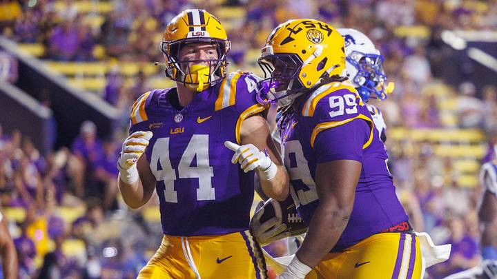 LSU Tigers defensive tackle Deuce Geralds (99) celebrates a touchdown against the McNeese Cowboys during the second half at Tiger Stadium. LSU Tigers defensive tackle Deuce Geralds (99) celebrates a touchdown against the McNeese Cowboys during the second half at Tiger Stadium.
