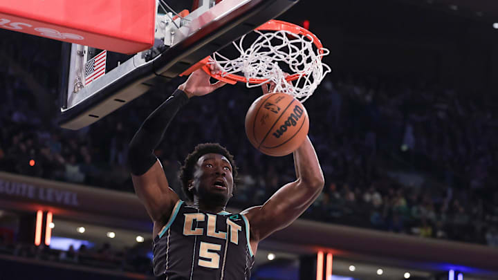 Mar 7, 2023; New York, New York, USA; Charlotte Hornets center Mark Williams (5) dunks the ball during the first quarter against the New York Knicks at Madison Square Garden. Mandatory Credit: Vincent Carchietta-Imagn Images