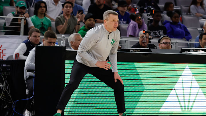 Mar 15, 2025; Fort Worth, TX, USA; North Texas Mean Green head coach Ross Hodge reacts against the UAB Blazers during the first half at Dickies Arena. Mandatory Credit: Chris Jones-Imagn Images Mar 15, 2025; Fort Worth, TX, USA; North Texas Mean Green head coach Ross Hodge reacts against the UAB Blazers during the first half at Dickies Arena. Mandatory Credit: Chris Jones-Imagn Images
