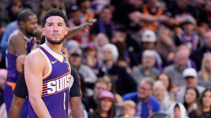 Nov 2, 2024; Phoenix, Arizona, USA;  Phoenix Suns guard Devin Booker (1) reacts after a time out in the second half during a game against the Portland Trail Blazers at Footprint Center. Mandatory Credit: Allan Henry-Imagn Images