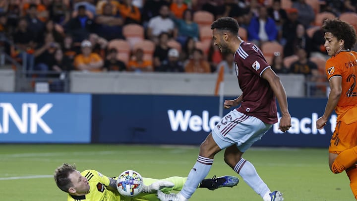 Mar 19, 2022; Houston, Texas, USA; Houston Dynamo FC goalkeeper Steve Clark (12) blocks a shot by