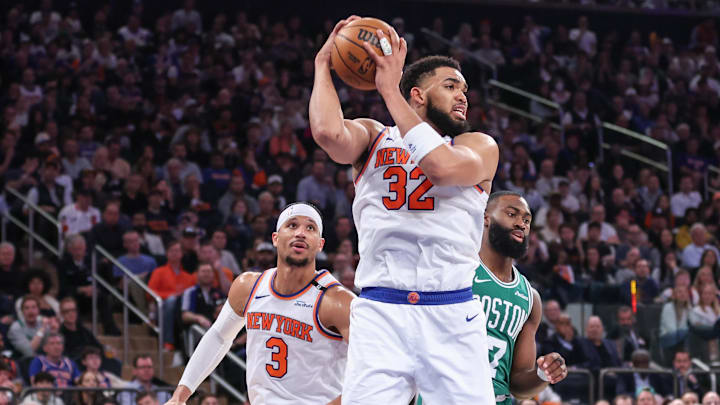 New York Knicks center Karl-Anthony Towns grabs a rebound in the third quarter against the Boston Celtics. Mandatory Credit: Wendell Cruz-Imagn Images