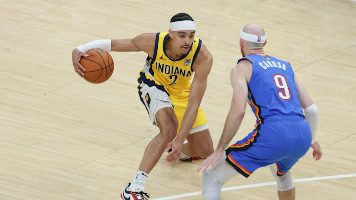 Indiana Pacers guard Andrew Nembhard (2) dribbles the ball defended by Oklahoma City Thunder guard Alex Caruso (9) in the second quarter during game six of the 2025 NBA Finals at Gainbridge Fieldhouse. Indiana Pacers guard Andrew Nembhard (2) dribbles the ball defended by Oklahoma City Thunder guard Alex Caruso (9) in the second quarter during game six of the 2025 NBA Finals at Gainbridge Fieldhouse.