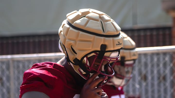 FSU football players walk into the first spring practice of the spring season on Wednesday, March 19, 2025