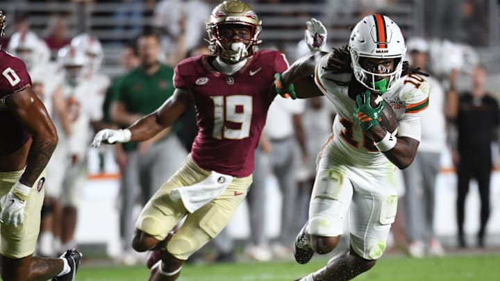 Oct 4, 2025; Tallahassee, Florida, USA; Miami Hurricanes wide receiver Malachi Toney (10) runs against Florida State Seminoles defensive back Jerry Wilson (19) during the second half at Doak S. Campbell Stadium. Mandatory Credit: Robert Myers-Imagn Images